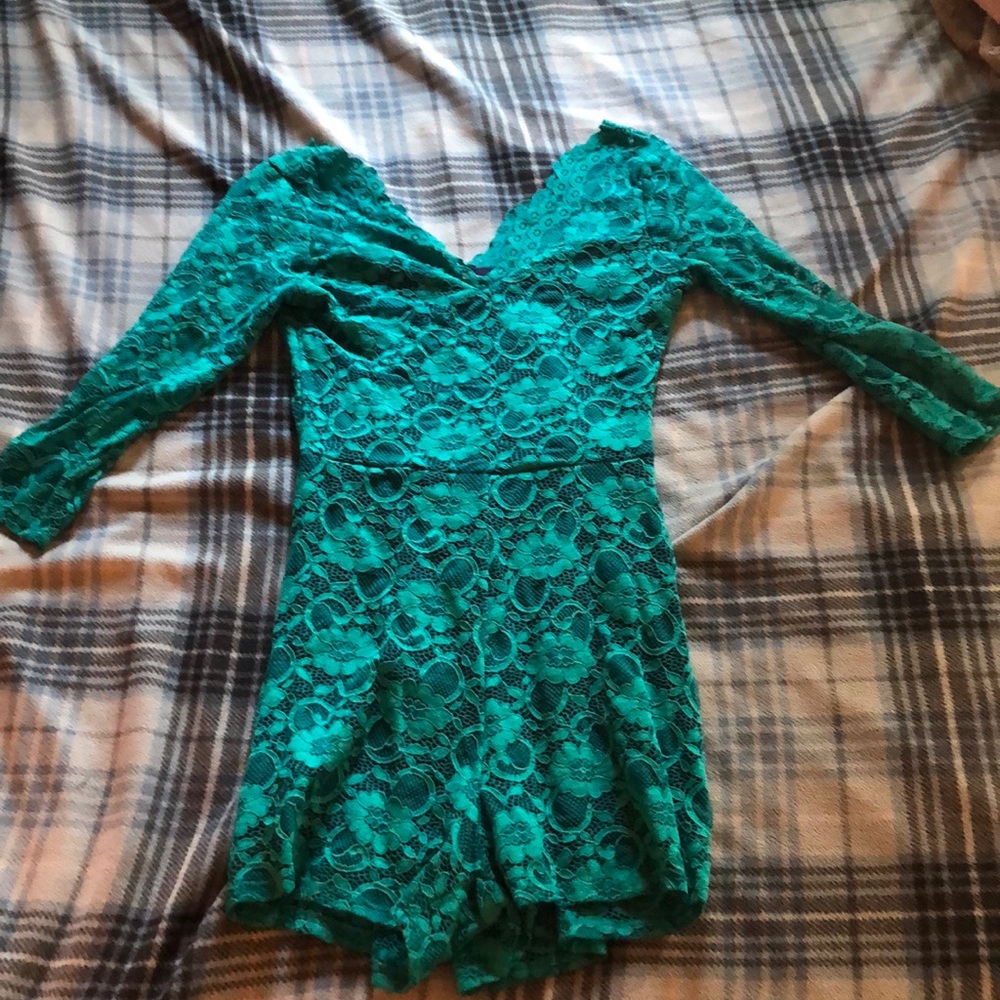 Green romper.